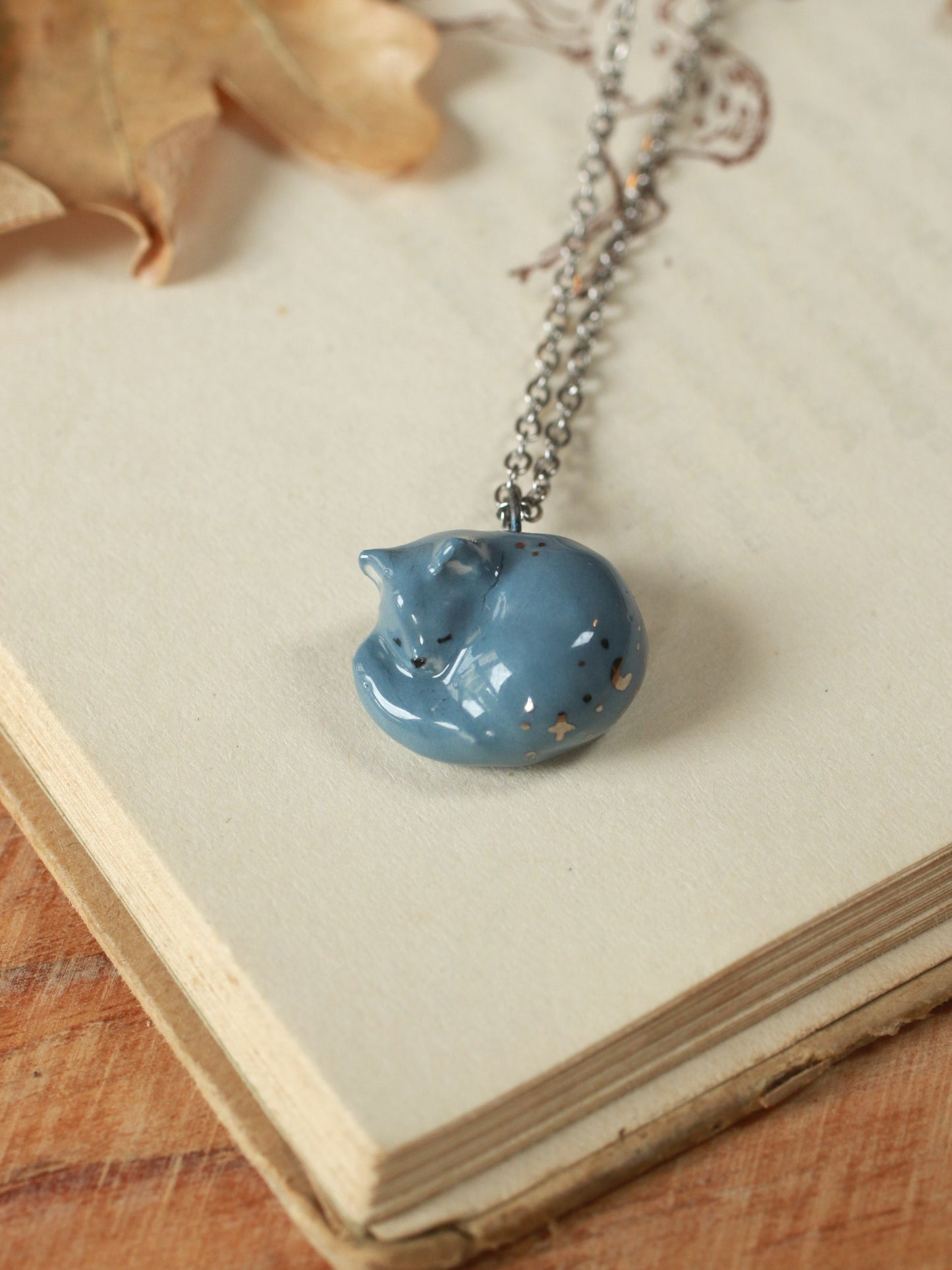 Sleeping grey cat necklace