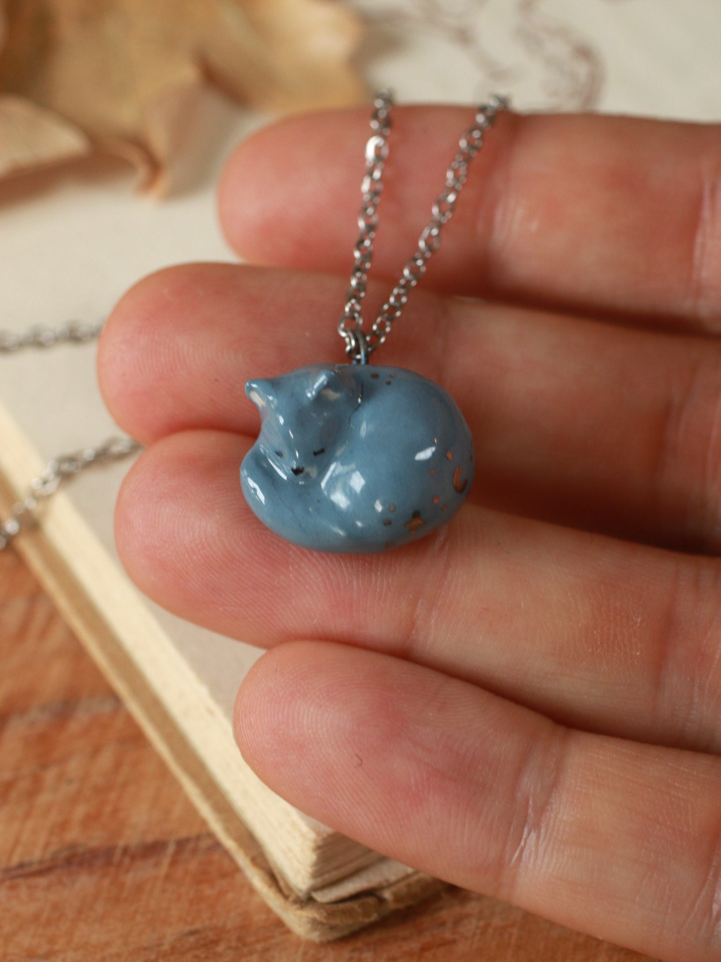 Sleeping grey cat necklace