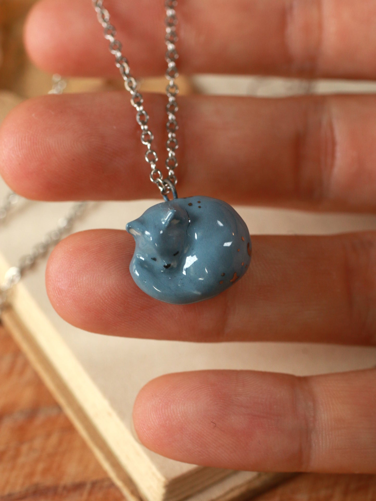 Sleeping grey cat necklace