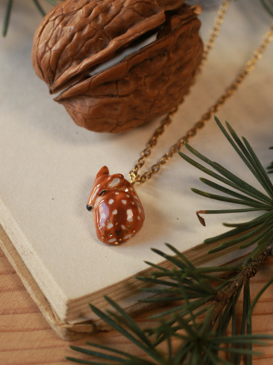Sleeping Fawn necklace in a walnut box