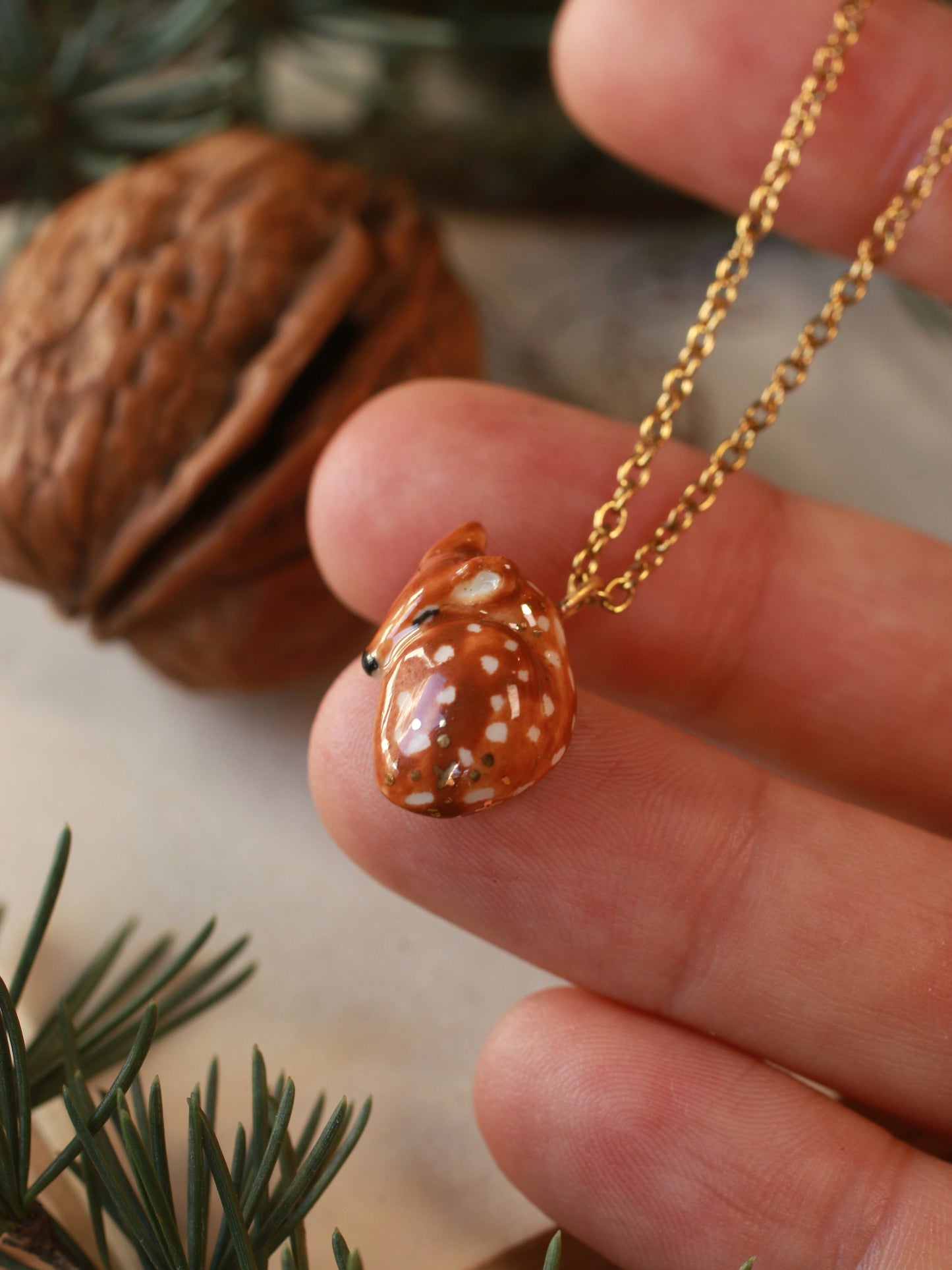 Sleeping Fawn necklace in a walnut box