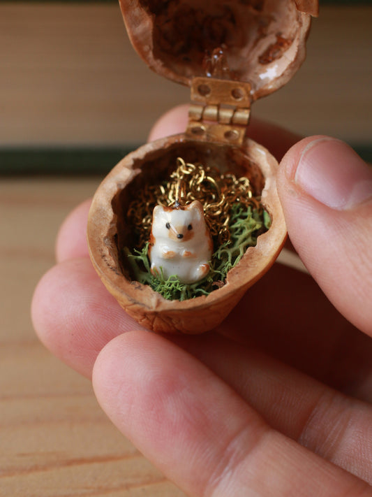 Hedgehog necklace in a walnut box