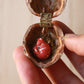 Sleeping squirrel necklace in a walnut box