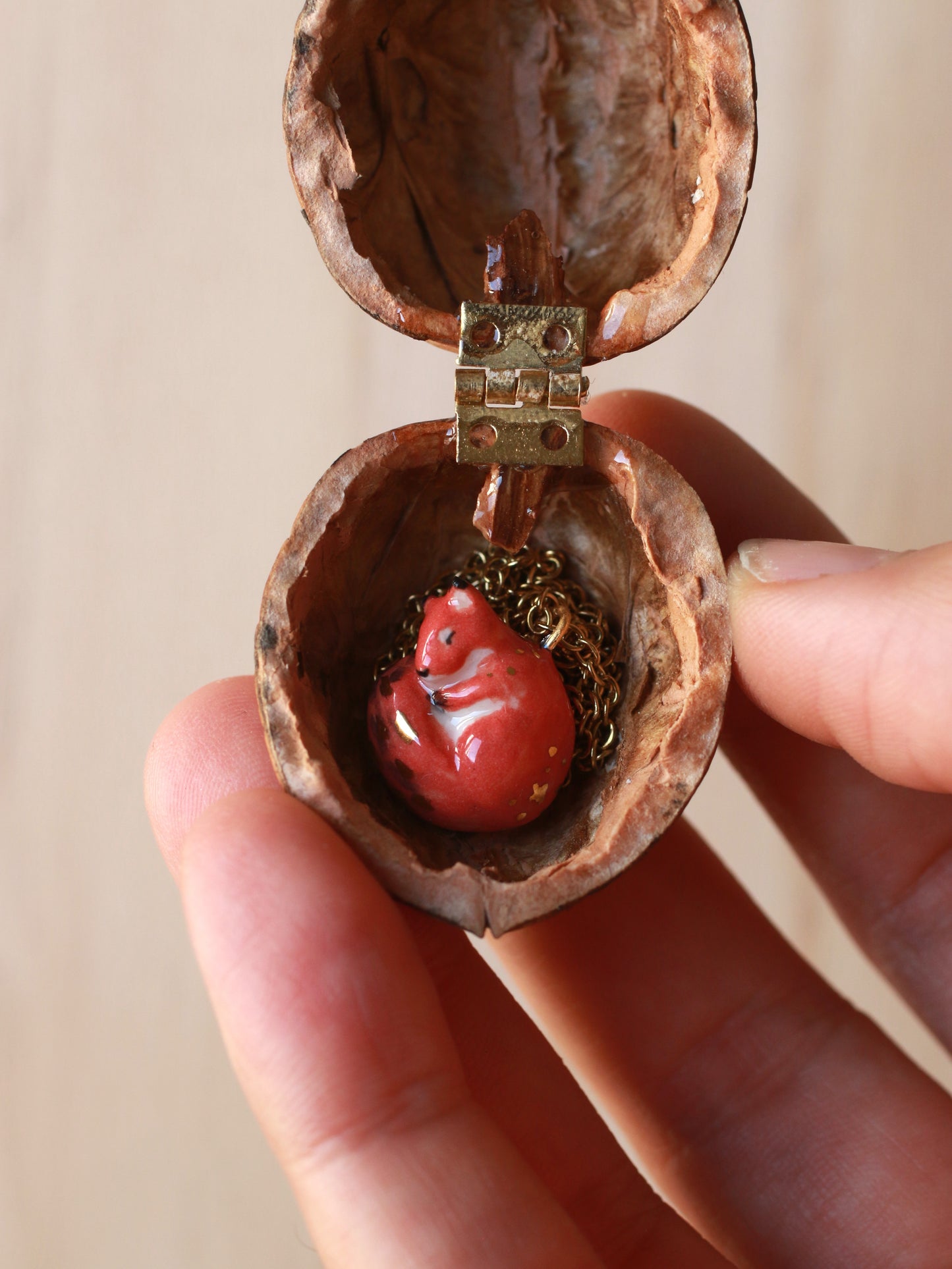 Sleeping squirrel necklace in a walnut box