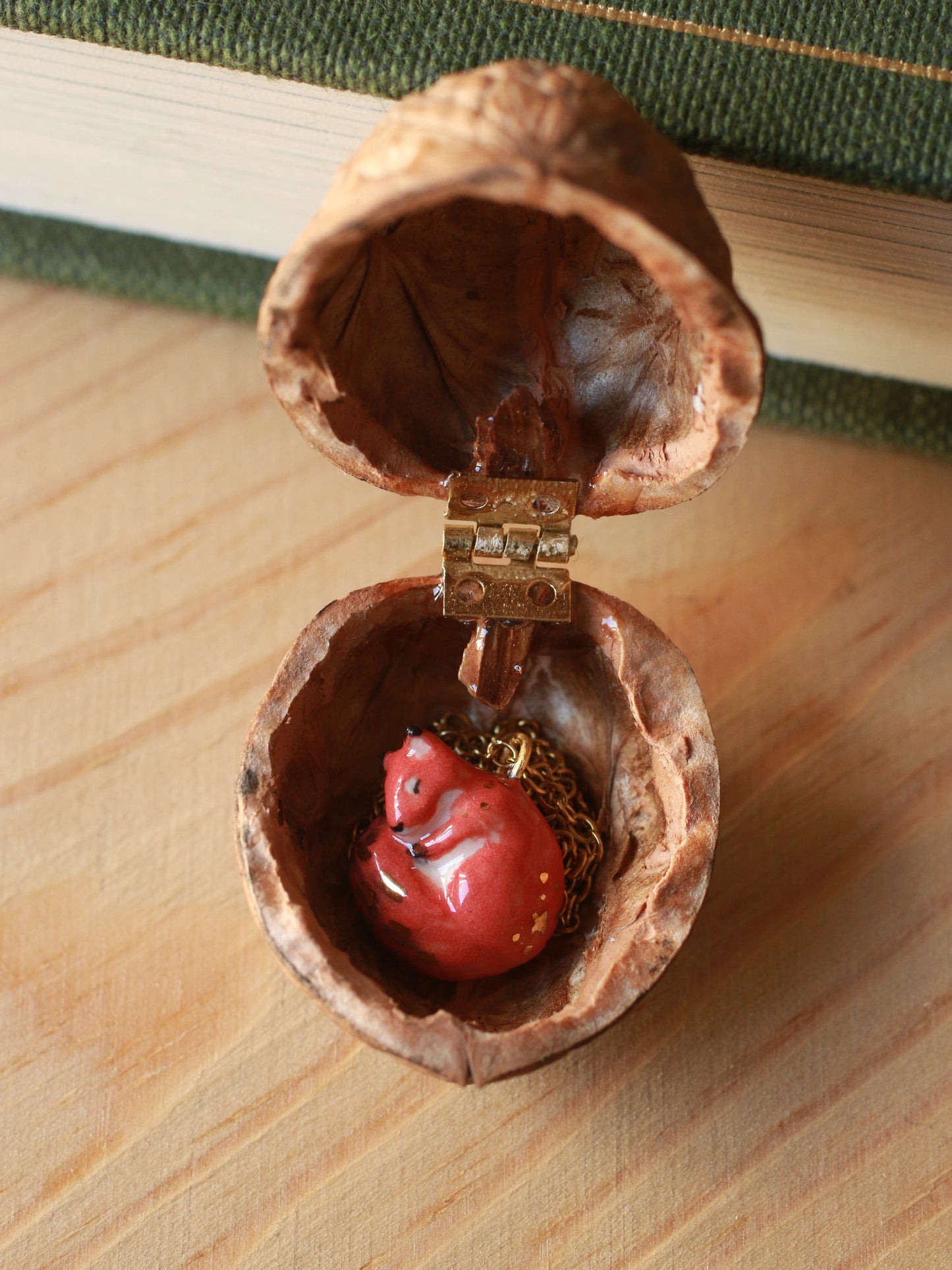 Sleeping squirrel necklace in a walnut box
