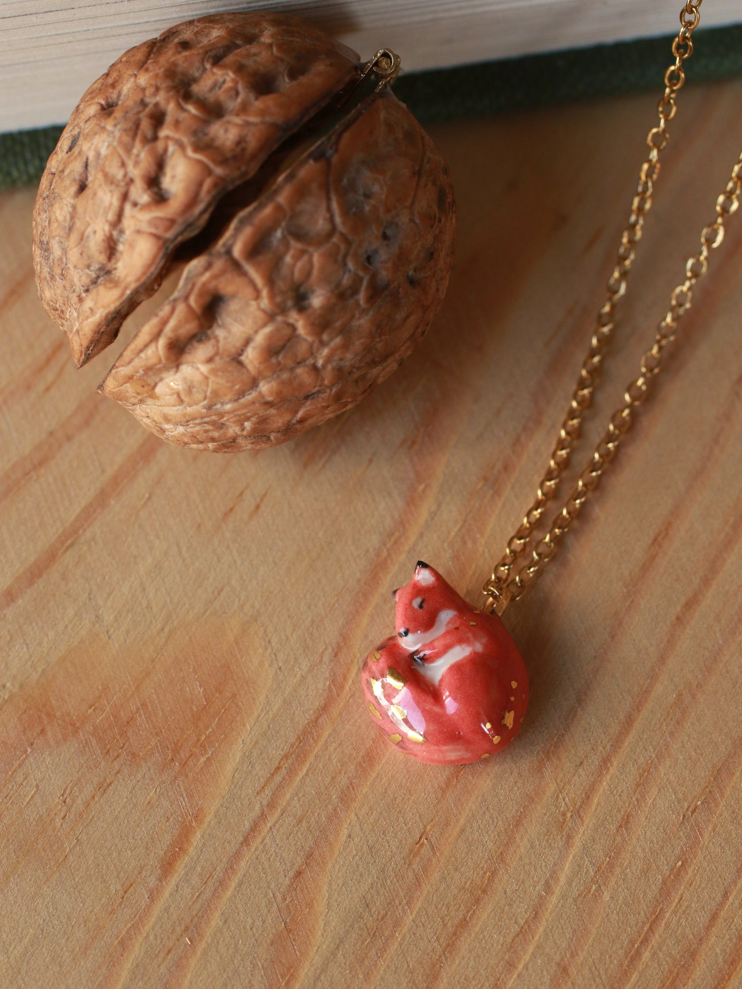 Sleeping squirrel necklace in a walnut box