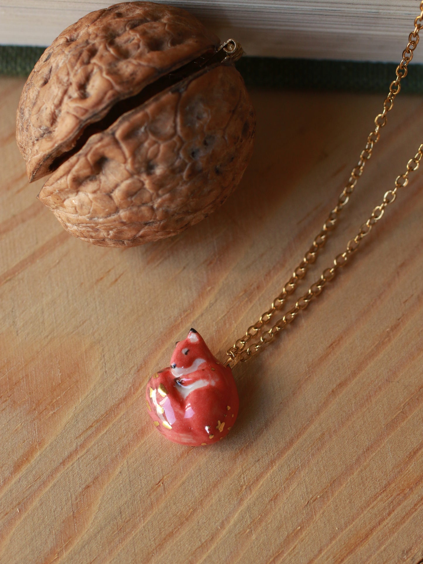 Sleeping squirrel necklace in a walnut box