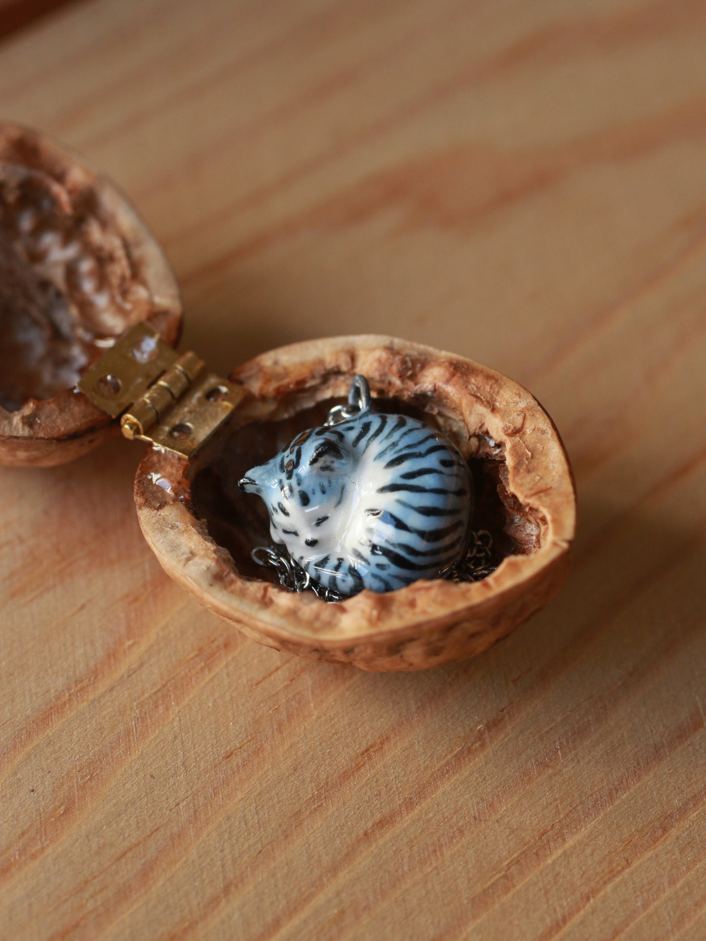 Sleeping grey tabby cat necklace in a walnut box