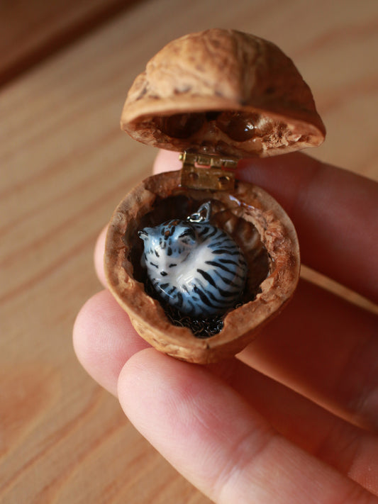 Sleeping grey tabby cat necklace in a walnut box