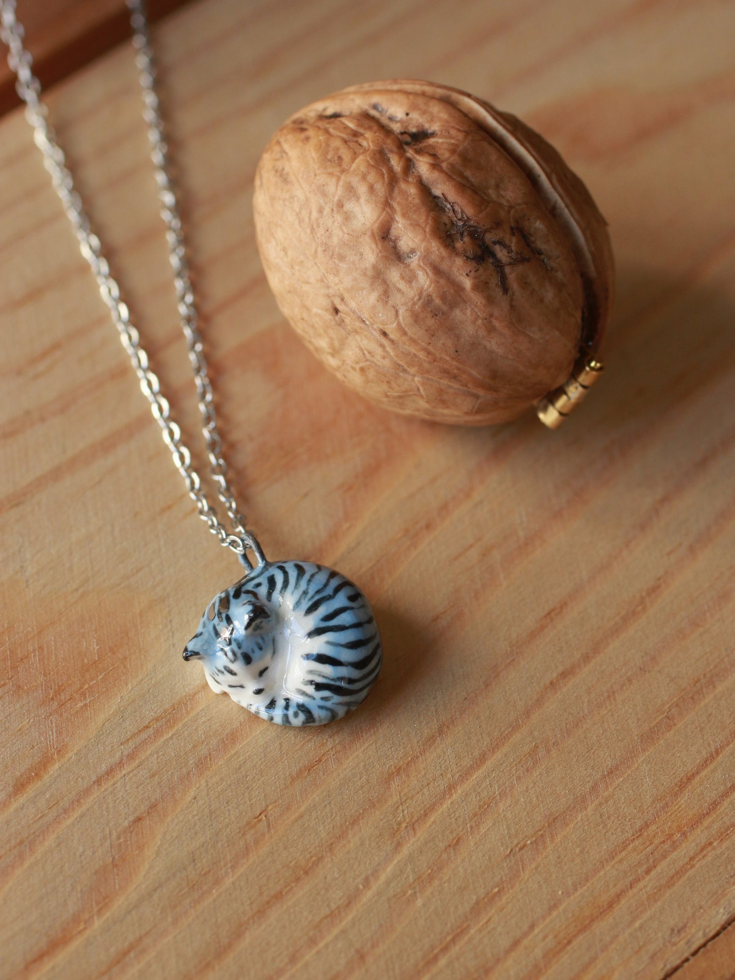 Sleeping grey tabby cat necklace in a walnut box