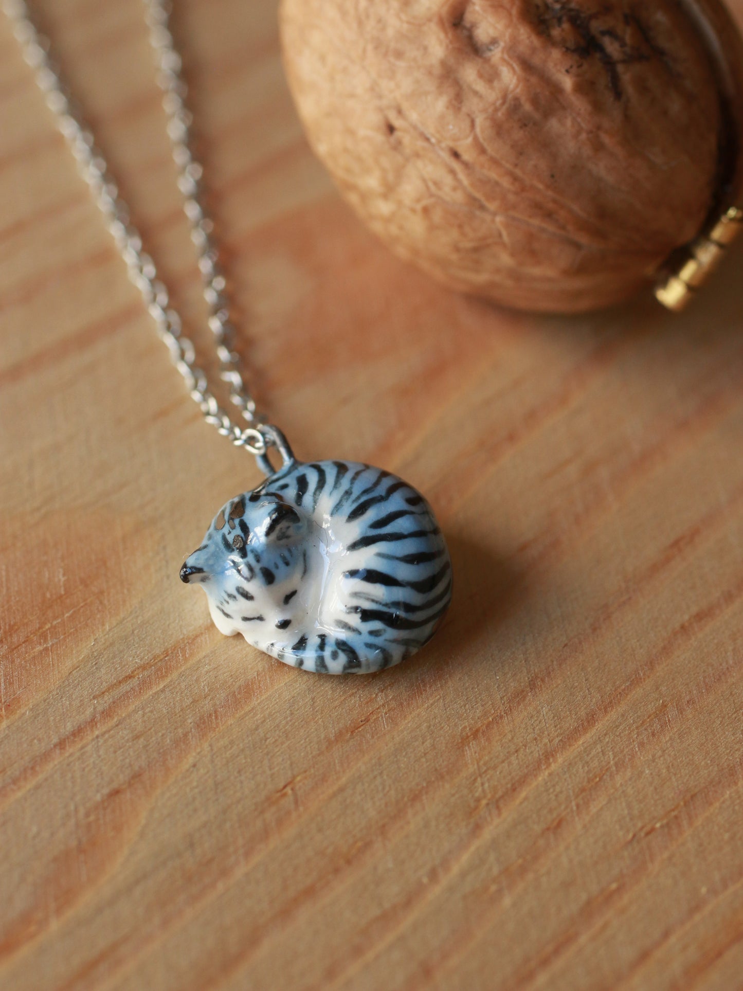 Sleeping grey tabby cat necklace in a walnut box
