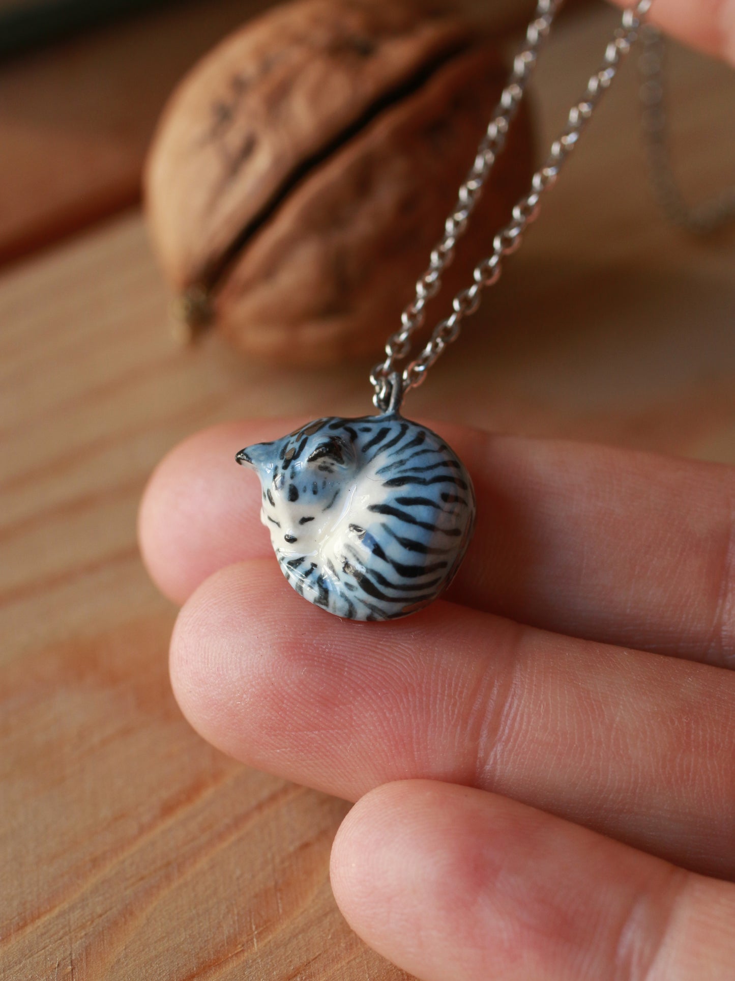 Sleeping grey tabby cat necklace in a walnut box