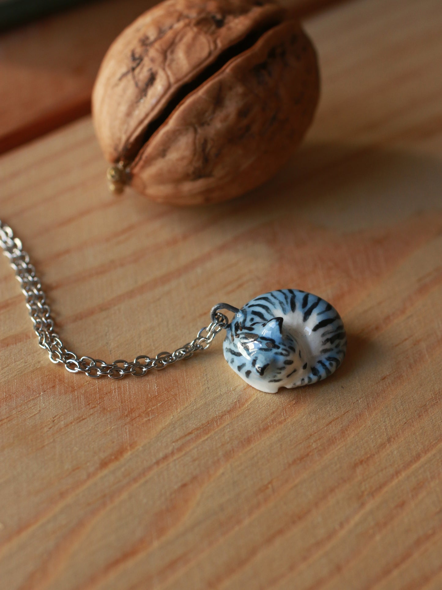 Sleeping grey tabby cat necklace in a walnut box