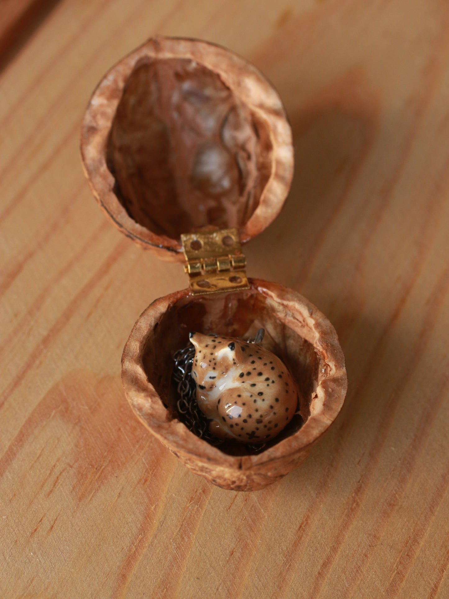 Sleeping Lynx necklace in a walnut box