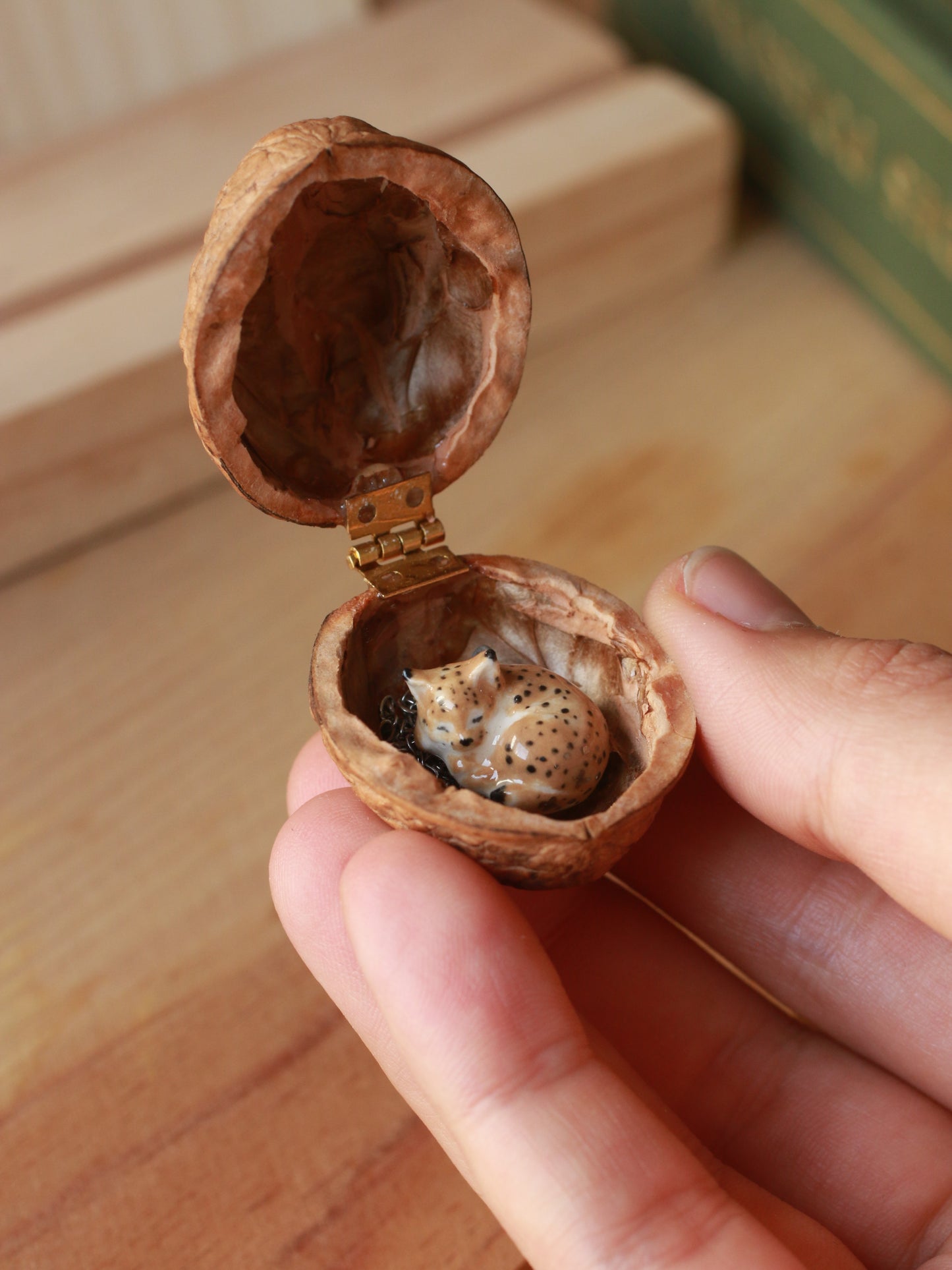 Sleeping Lynx necklace in a walnut box