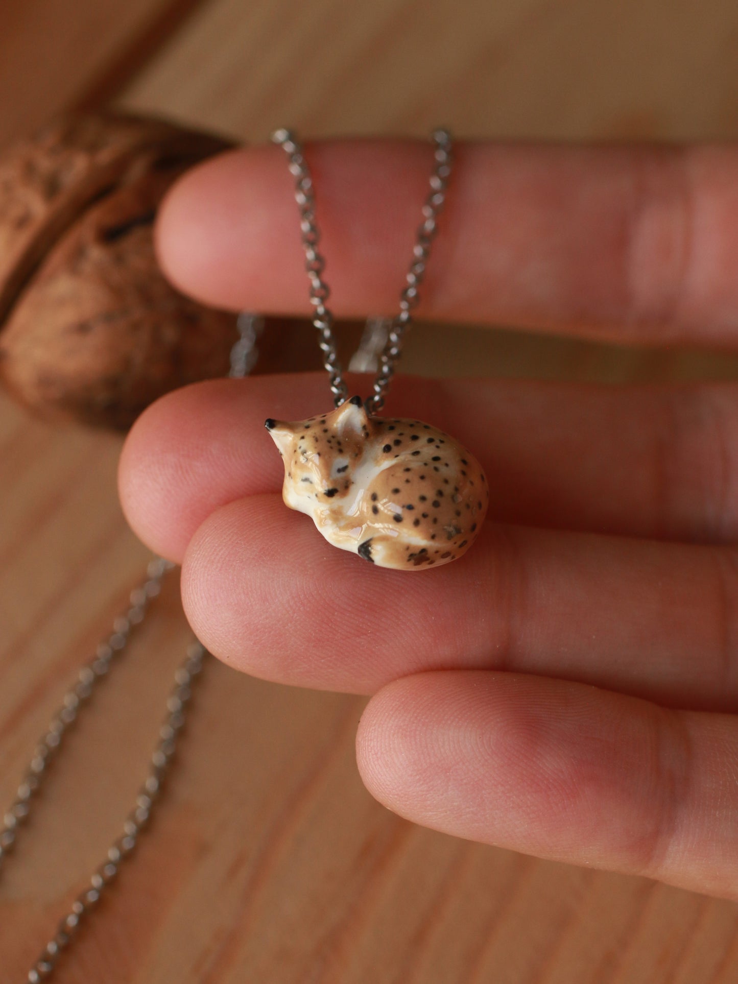 Sleeping Lynx necklace in a walnut box