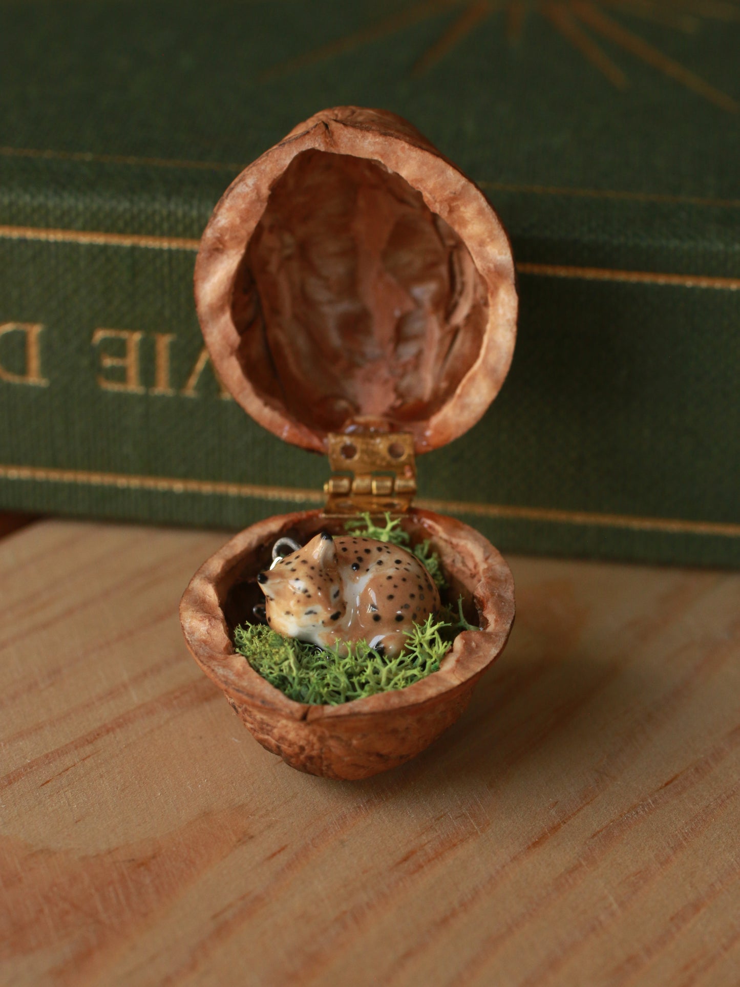 Sleeping Lynx necklace in a walnut box
