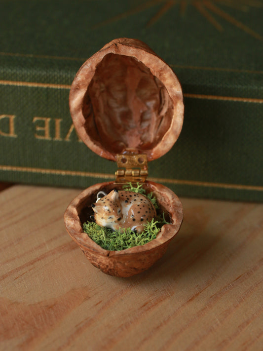 Sleeping Lynx necklace in a walnut box