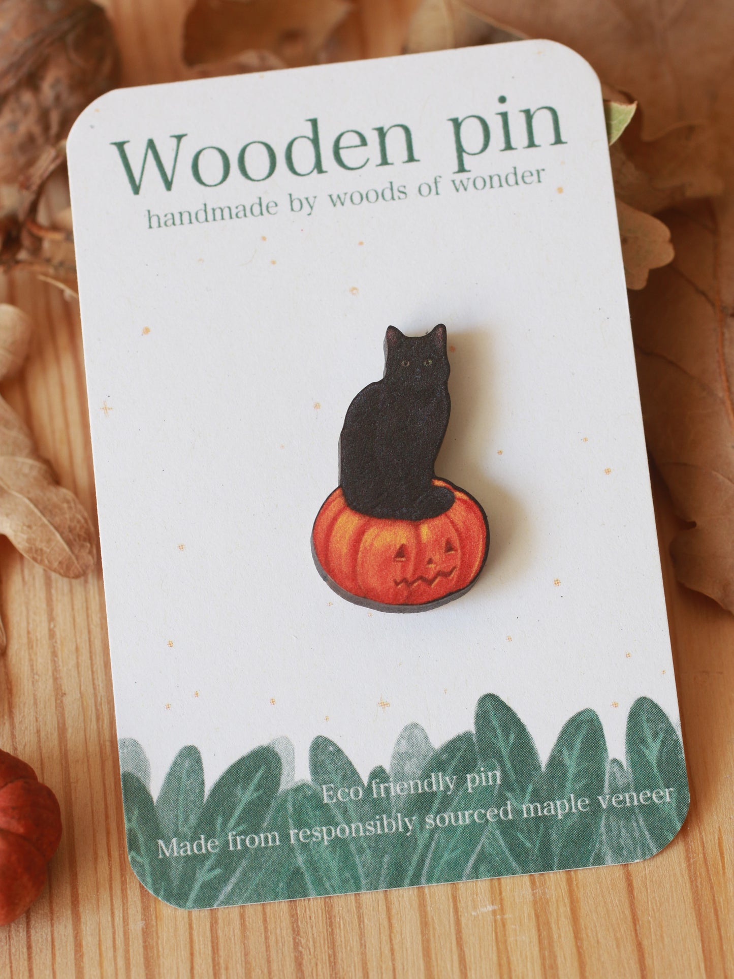 Black cat on a Jack-o'-Lantern wooden pin