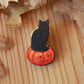 Black cat on a Jack-o'-Lantern wooden pin