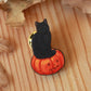 Black cat on a Jack-o'-Lantern wooden pin