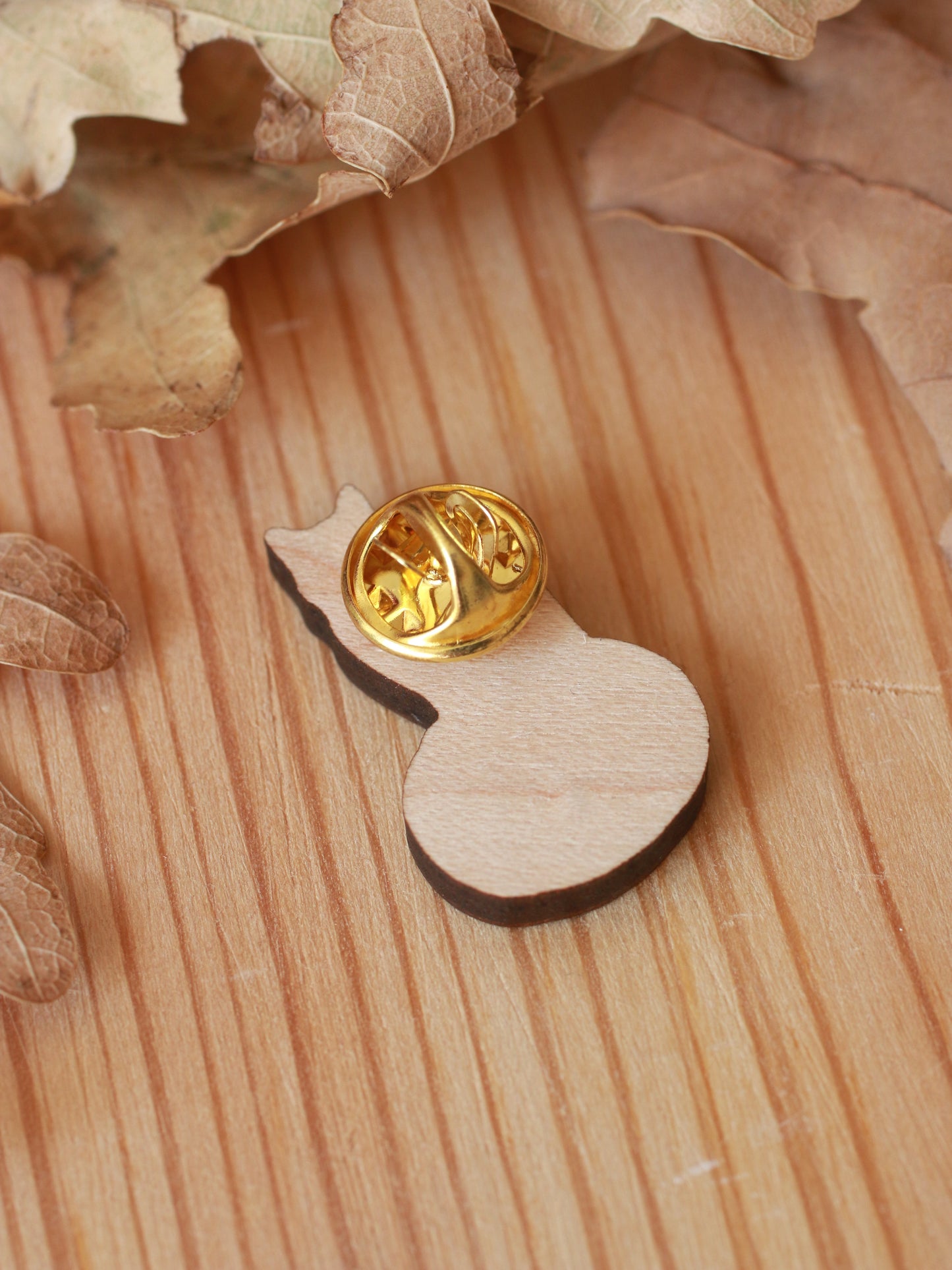 Black cat on a Jack-o'-Lantern wooden pin