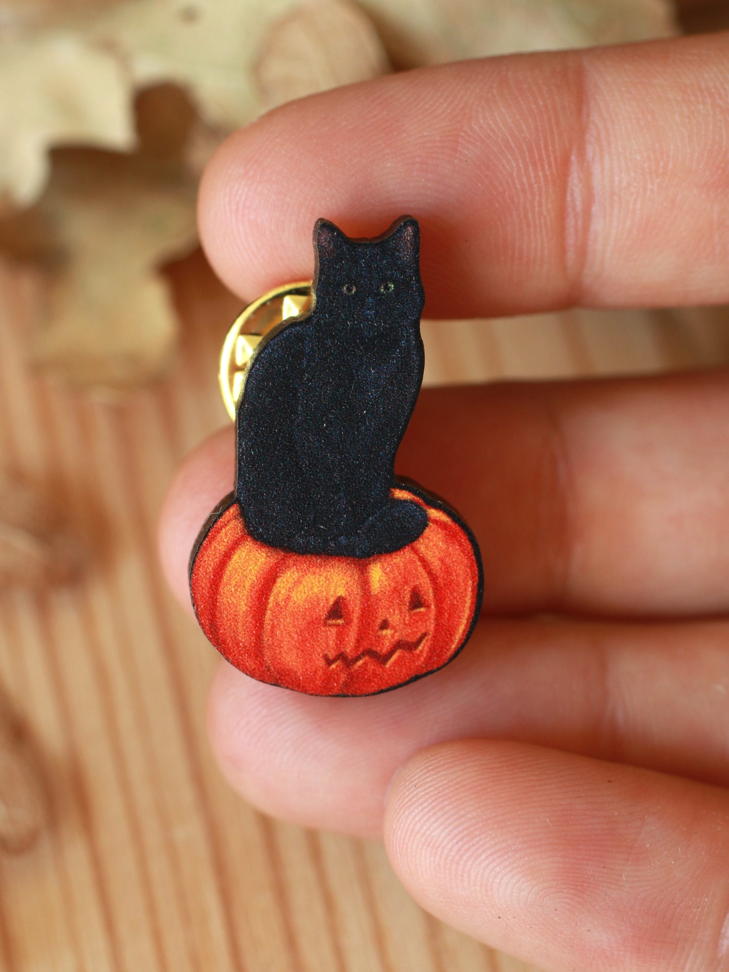 Black cat on a Jack-o'-Lantern wooden pin