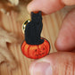 Black cat on a Jack-o'-Lantern wooden pin