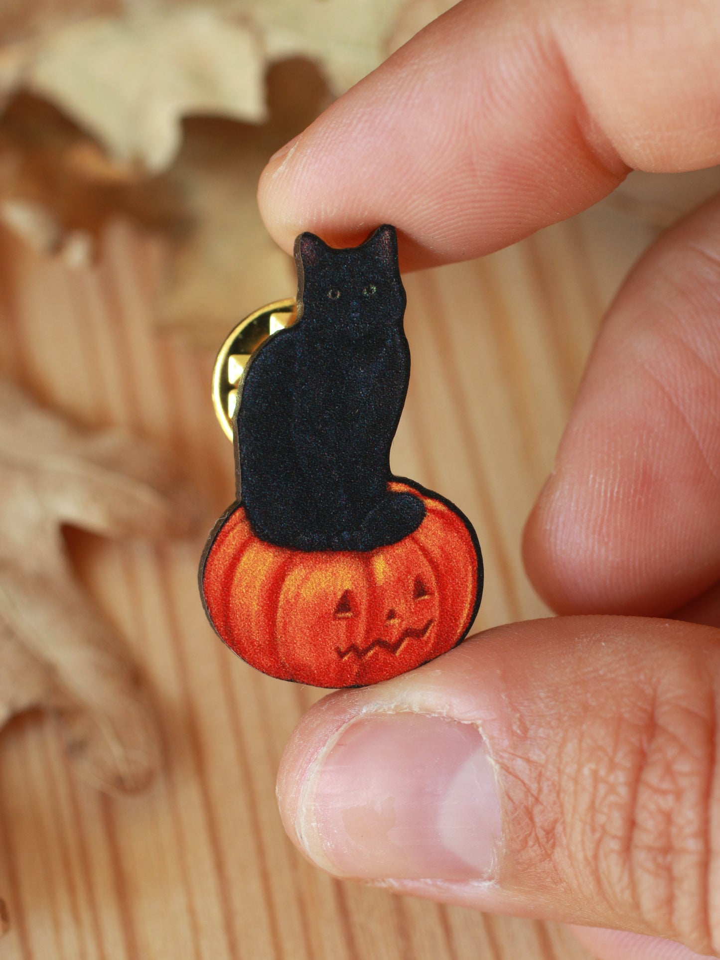 Black cat on a Jack-o'-Lantern wooden pin