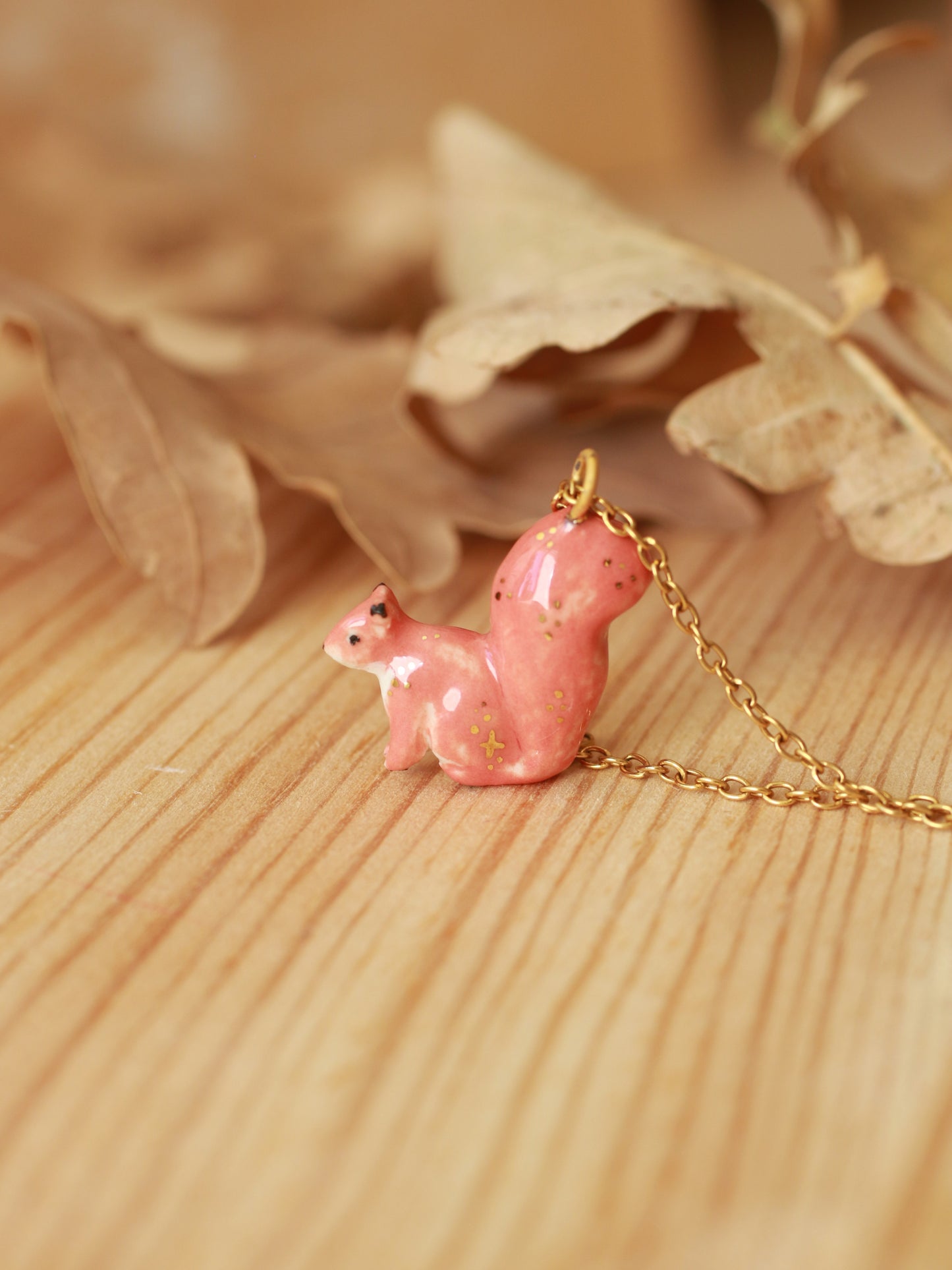 Ceramic squirrel necklace - 22k gold details