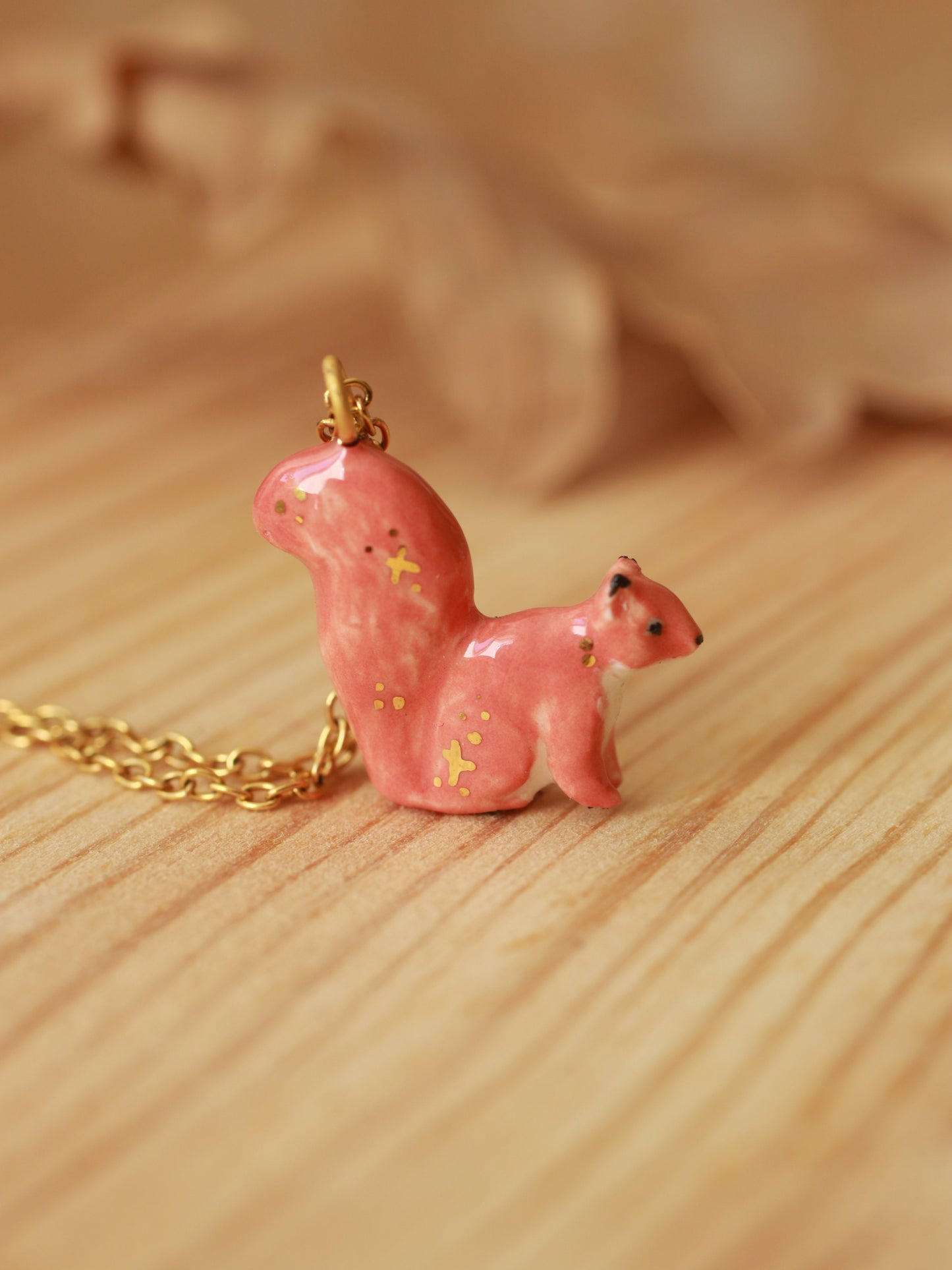 Ceramic squirrel necklace - 22k gold details