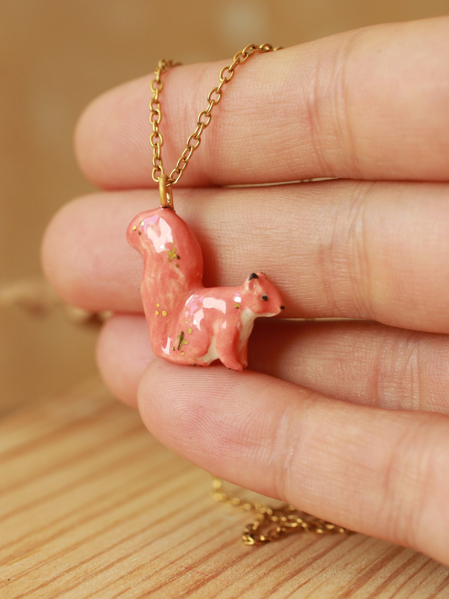 Ceramic squirrel necklace - 22k gold details