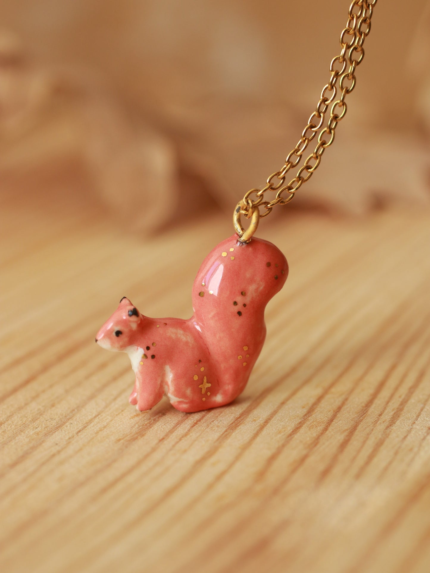 Ceramic squirrel necklace - 22k gold details