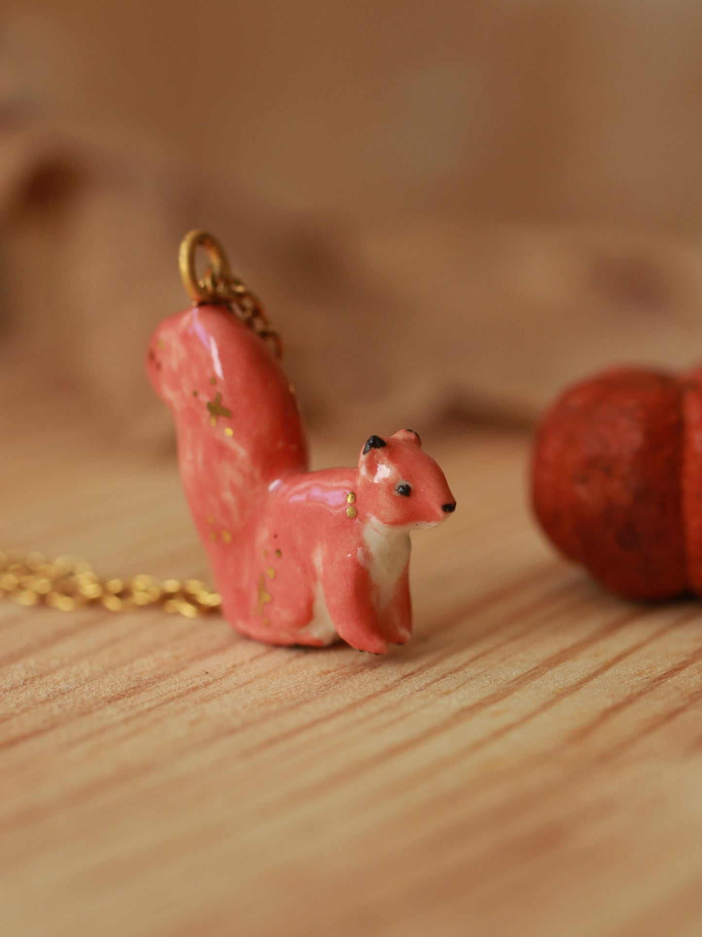 Ceramic squirrel necklace - 22k gold details