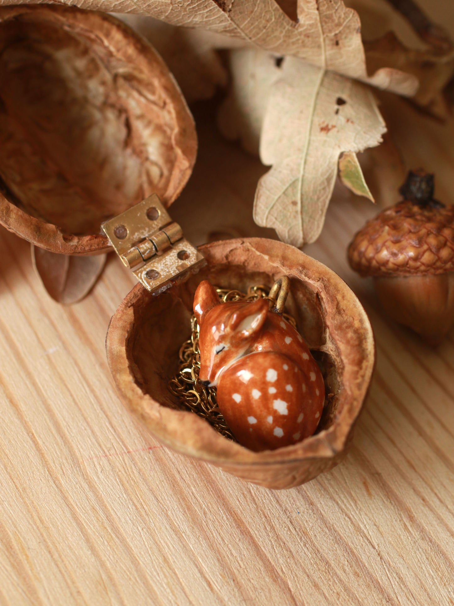 Sleeping Fawn necklace in a walnut box