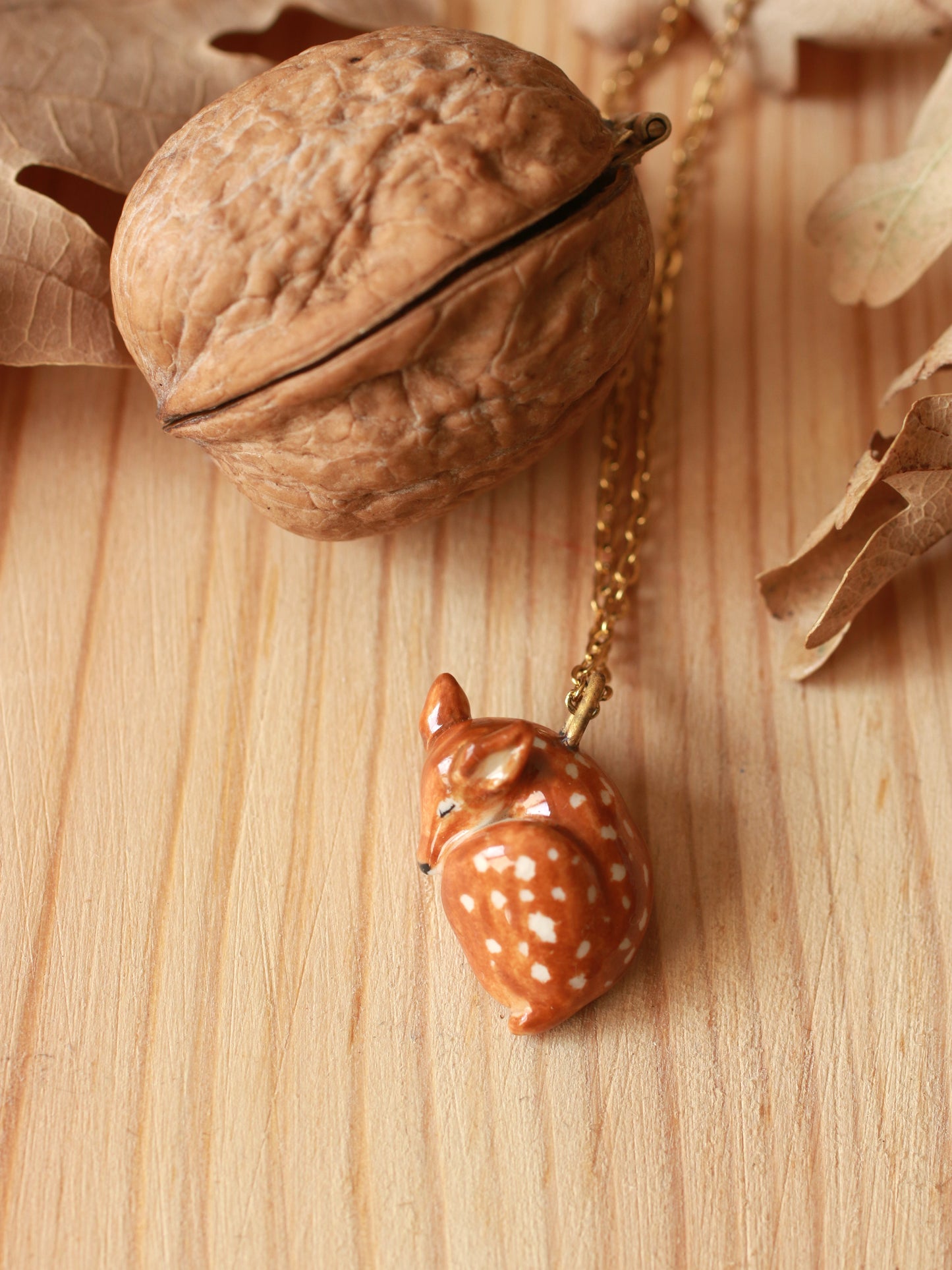 Sleeping Fawn necklace in a walnut box