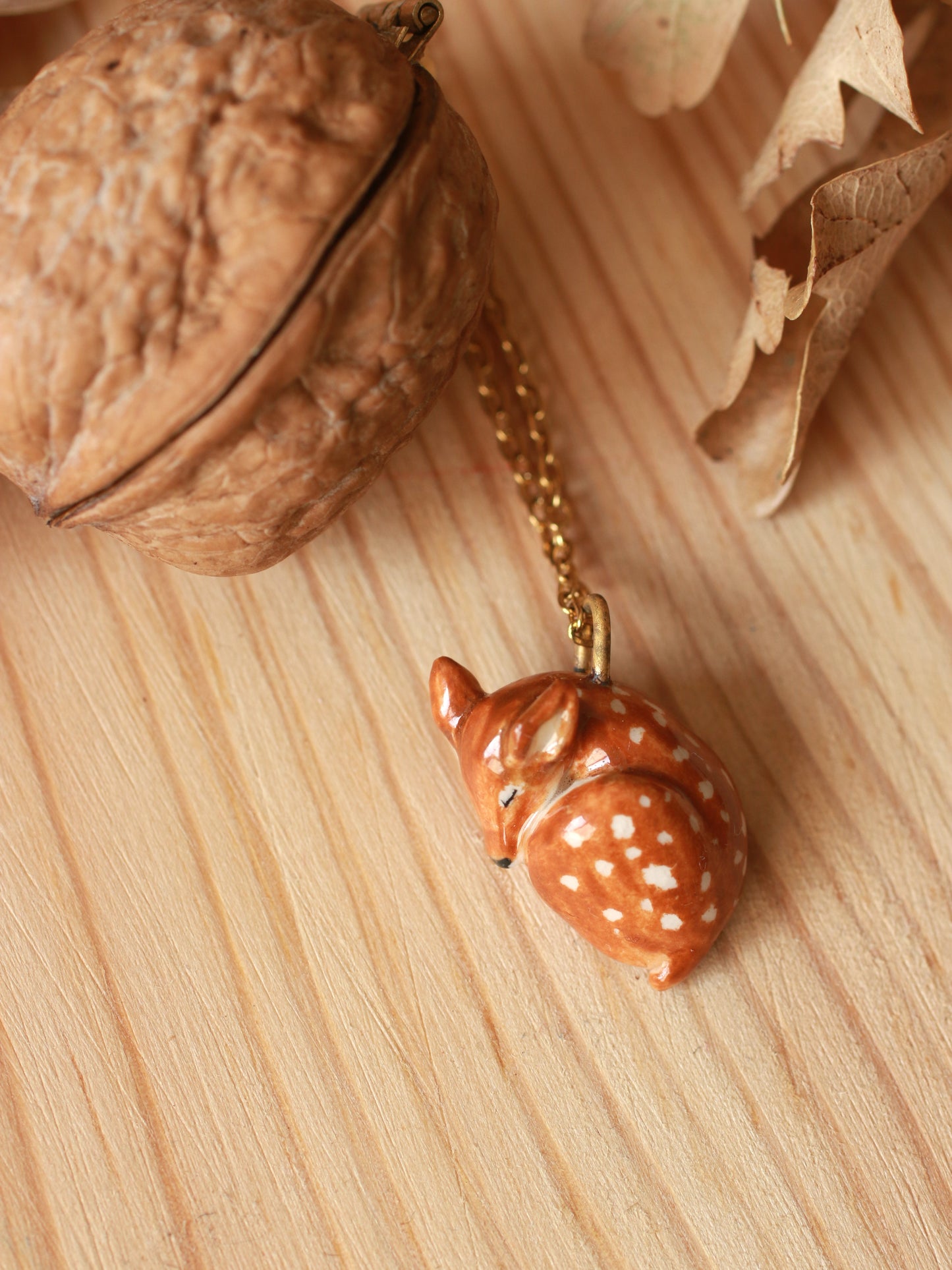 Sleeping Fawn necklace in a walnut box