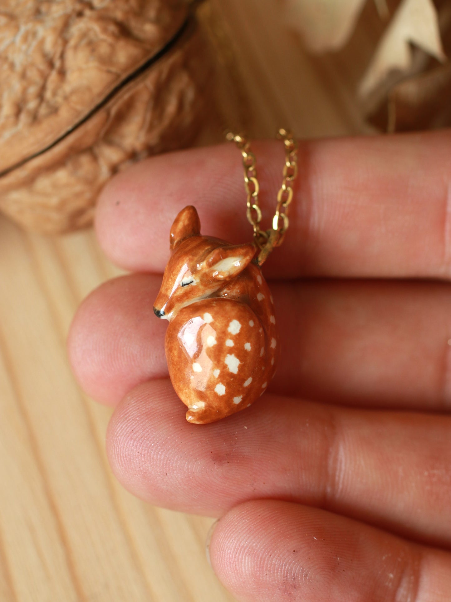 Sleeping Fawn necklace in a walnut box