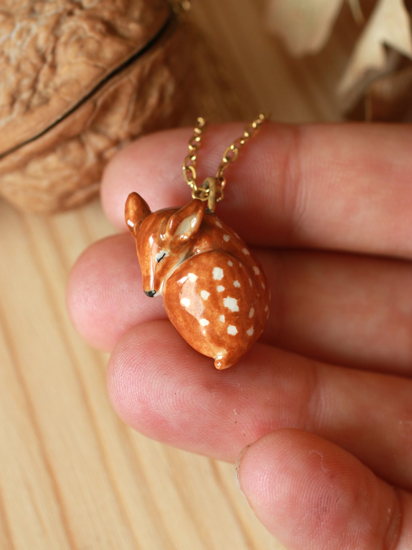 Sleeping Fawn necklace in a walnut box