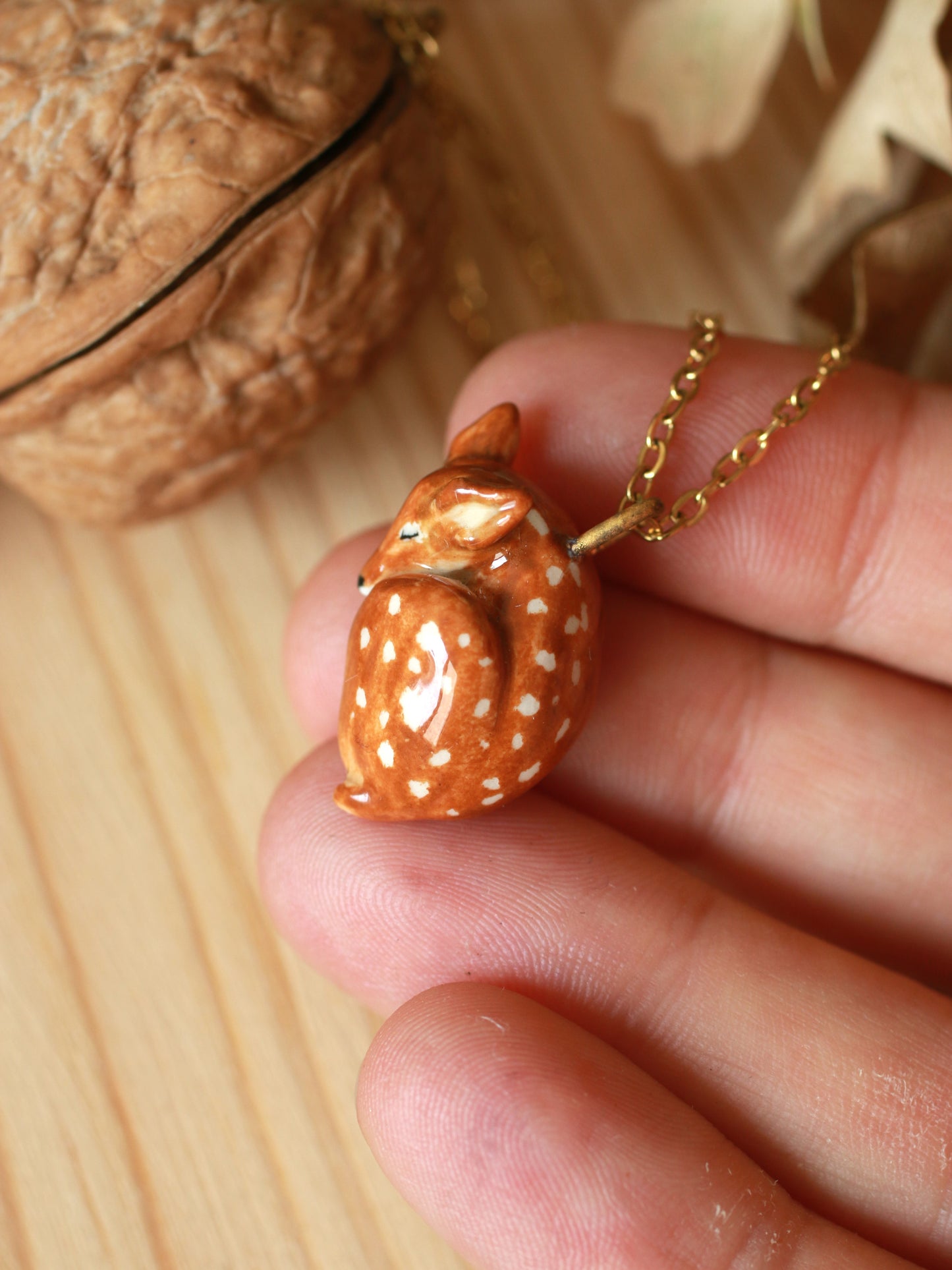 Sleeping Fawn necklace in a walnut box