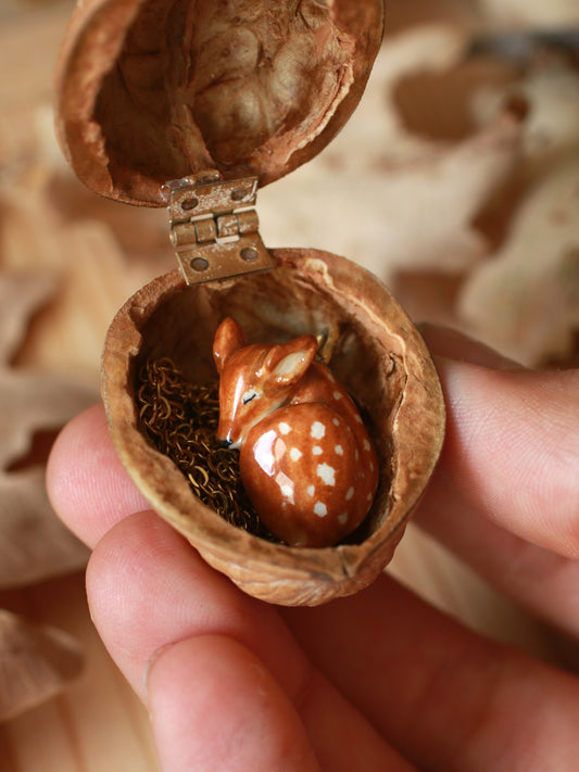 Sleeping Fawn necklace in a walnut box