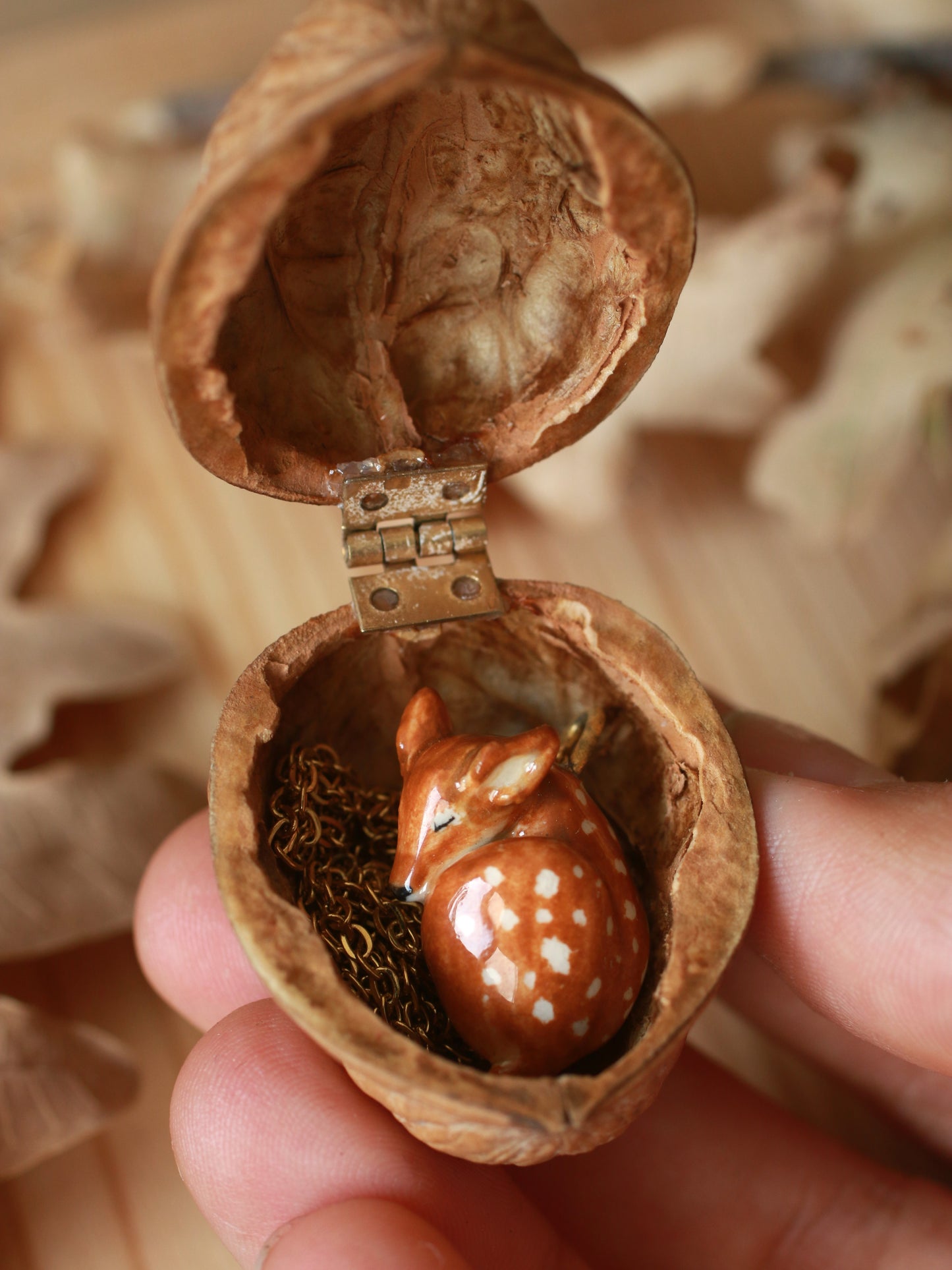 Sleeping Fawn necklace in a walnut box