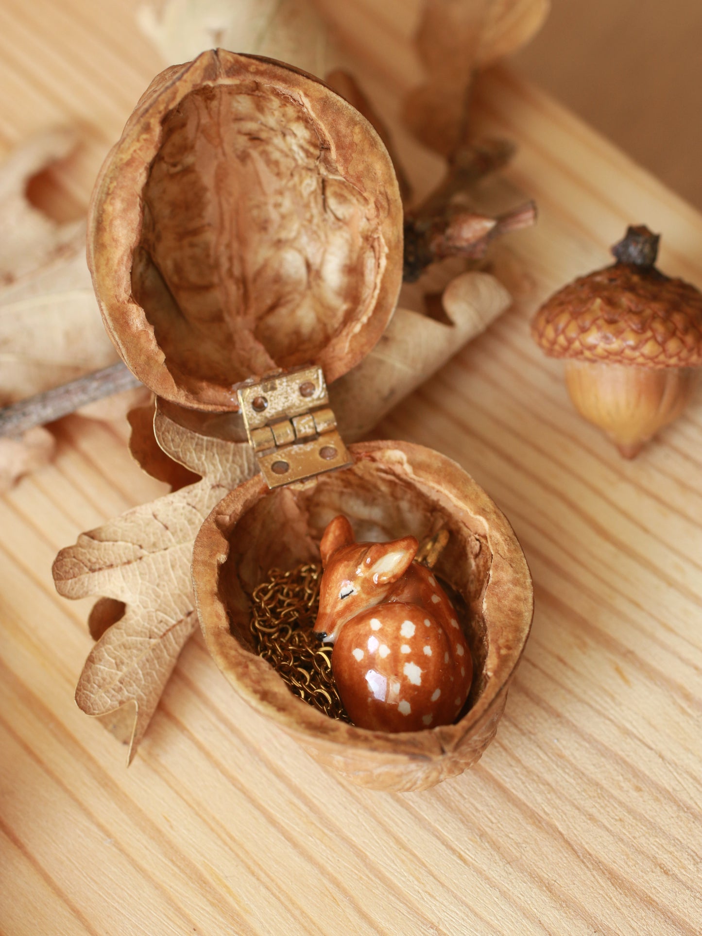 Sleeping Fawn necklace in a walnut box