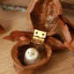 Baby barn owl figure in a walnut box