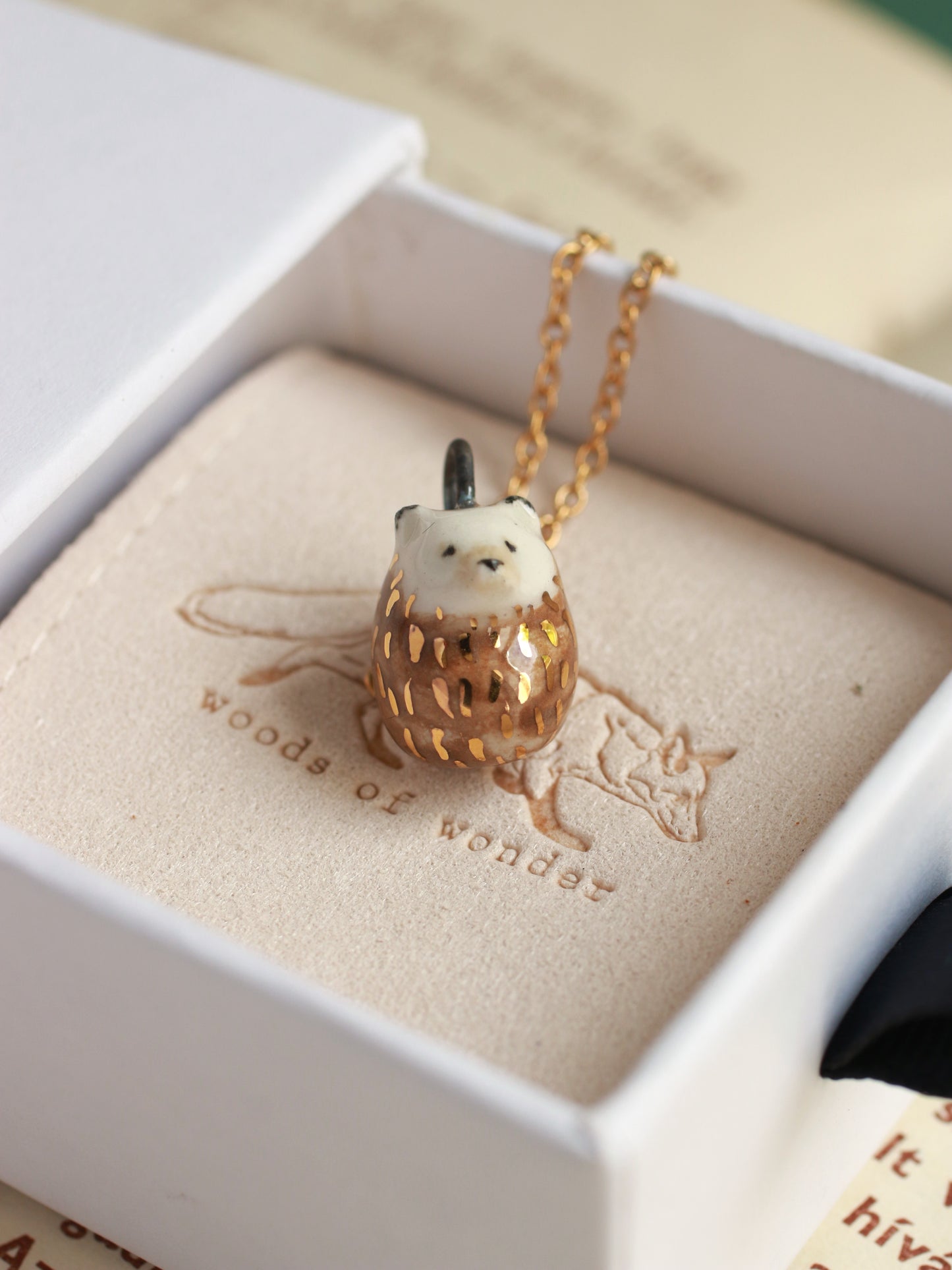 Ceramic Hedgehog necklace in a walnut box - 22k gold details