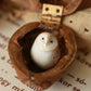 Baby barn owl figure in a walnut box