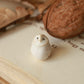 Baby barn owl figure in a walnut box