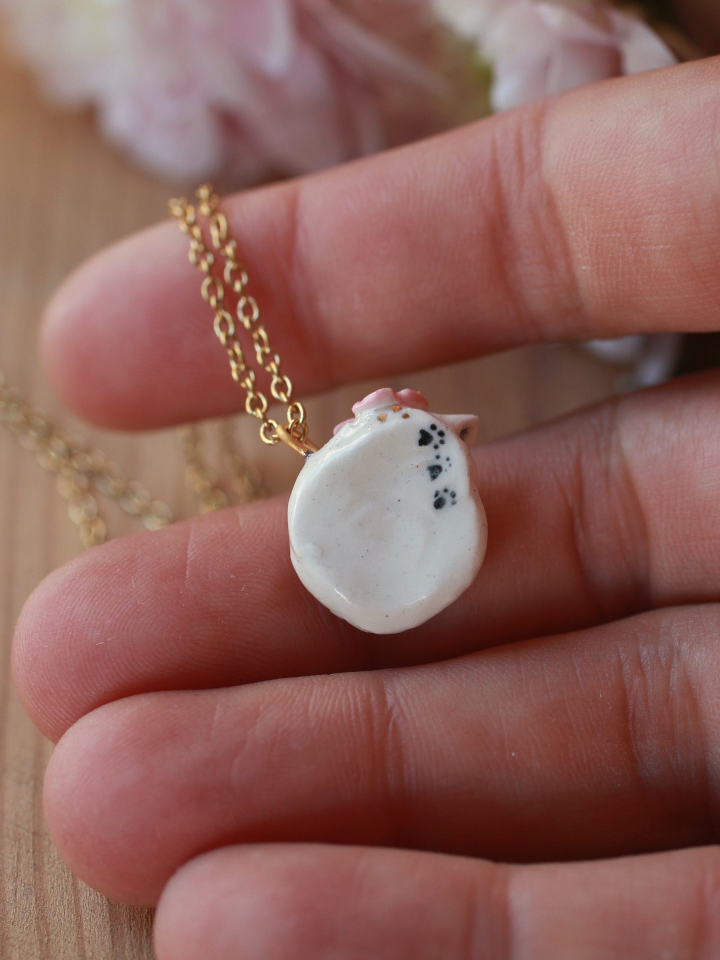 Sleeping cat necklace in a walnut box