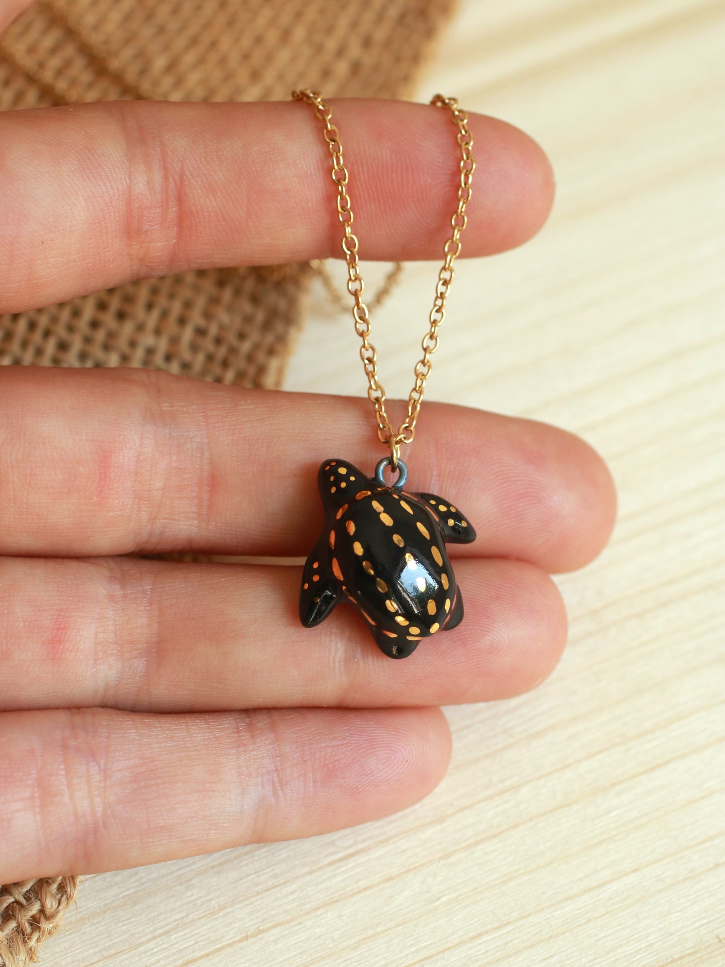 Ceramic black sea turtle necklace -  with 22k gold details