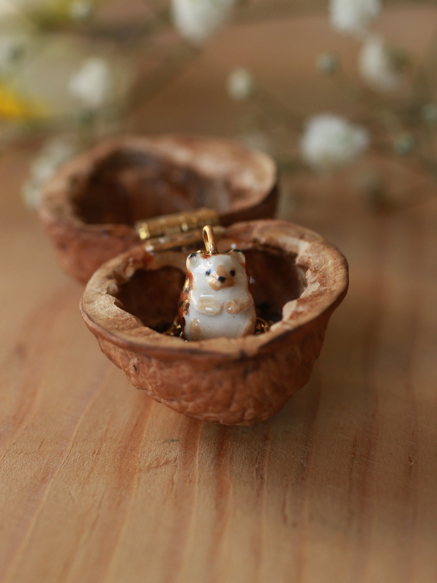 Hedgehog necklace in a walnut box